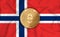 Norway flag  ethereum gold coin on flag background. The concept of blockchain  bitcoin  currency decentralization in the country.