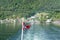 Norway flag and the Geirangerfjord, Norway.