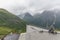 Norway - June 15, 2016: tourists, motorcyclists on viewpoint admire the views of the mountain landscape