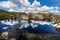 Norway Landscape. Close To Preikestolen Sightseeing Place. Mountain, Blue Sky. Reflection on Mountain Lake.