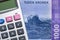 Norway money, 1000 norwegian kroner banknote and calculator, financial calculation concept