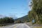 Norway road with radar speed limit sigh near road. Traveling by car, driving nature tourism