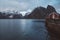 Norway rorbu houses and mountains rocks over fjord landscape scandinavian travel view Lofoten islands. Night landscape