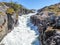 Norway - A rough waterfall falling to a rocky gorge