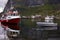 Norway tourist, ships at sea and mountains. Fishing village,