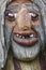 Norwegian carved wooden face detail troll. Scandinavian folklore