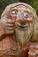 Norwegian carved wooden face detail troll. Scandinavian folklore