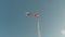 Norwegian flag, pennant, on flag pole in cold breeze in winter sunshine