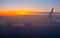 Norwegian flight image at sunrise in the ocean beyond Menorca