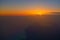 Norwegian flight image at sunrise in the ocean beyond Menorca