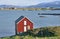 Norwegian landscape with a typical red house