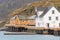 Norwegian old city with reflections in water and cloudy sky, nor