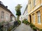 Norwegian old streets Bergen outdoor bright cozy atmosphere houses with green plants