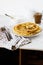 Norwegian potato pancakes Lefse in a white plate  on table.