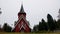 Norwegian red church Hol kyrkje at Hagafoss in Buskerud Norway in autumn