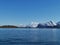 Norwegian sailing trollfjord and coast during a winter sail with snow