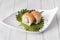 Norwegian salmon uramaki roll with avocado, fresh cheese, nori seaweed,