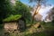 Norwegian typical grass roof wooden old house in glacier panorama