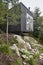 Norwegian wooden modern cabin in the forest. Tubakuba. Bergen ar