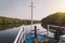 The nose of the boat. Dry mangrove trees.