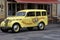 Nostalgic delivery car in front of a  a bakery