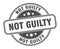 not guilty stamp. not guilty round grunge sign.