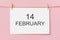 note letter pin on rope on pink background  love and valentine concept with text 14 february