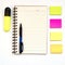 Note paper, open notepad, blank multicolored paper blocks for notes on white, pen. Concept of study, planning copy space