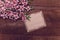 Note, postcard, writing retro peach blossoms on a wooden vintage