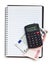 Notebook with euro money and calculator