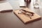 Notebook with eyeglasses on table prepared for business meeting in conference hall