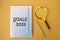 Notebook Goals 2023 on a yellow background. Motivation, inspiration. Planning, plans and tasks. New business ideas. Setting goal,