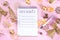 Notebook with New`s Year Resolutions massage, with Christmas ornaments and decor. New Year goals List 2023, plan listing of new