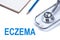 Notebook and pencil with ECZEMA word on the table with stethoscope, Skin diseases concept