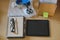 notebook, tablet, packing accessories at workplace of startup sm