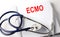 Notebook with text ECMO with pen and stethoscope