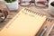 Notebook with to-do list on wooden table, closeup. Time management concept
