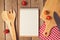 Notepad with blank space with cooking utensil on wooden table