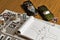 Notepad, book of traffic rules, toy cars, traffic lights and stop sign on a desk table