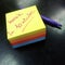 Notepad of color papers with message, back in 10 minutes