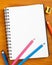 Notepad with color pencils