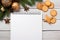 Notepad with fresh cookies from christmas over a white background. AI Generated