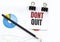 Notepad with text DONT QUIT on business charts and pen