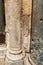 Notes  for the Almighty nested between the stone columns at the entrance to the Church of the Holy Sepulcher in Christian quarters