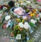 Notes and flowers are left at the Supreme Court of the United States in memory of the late Supreme