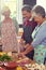 Nothing better than food, fun and friends. Shot of a group of mature friends cooking at home.