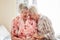 Nothing inspires happiness like a good old friend. Shot of two happy elderly women embracing each other at home.