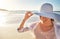 Nothing is more relaxing than a day at the beach. a mature woman enjoying a day at the beach.