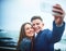 Nothing says love like a couple selfie. a happy young couple taking a selfie outdoors.