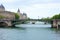 Notre Dame Bridge over the River Seine in Paris, France, with Bailiffs-Audienciers of the Commercial Court of the Seine and
